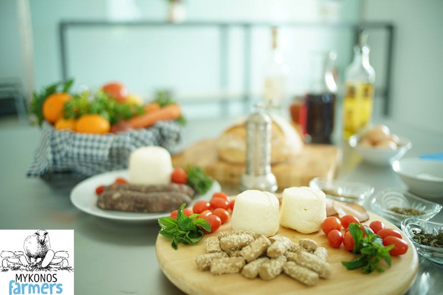 'Mykonos Farmers' cheese balls and sticks bread and tomatoes cherry on the wood plate